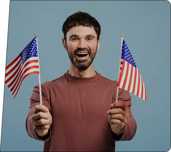 Happy man holding two American flags